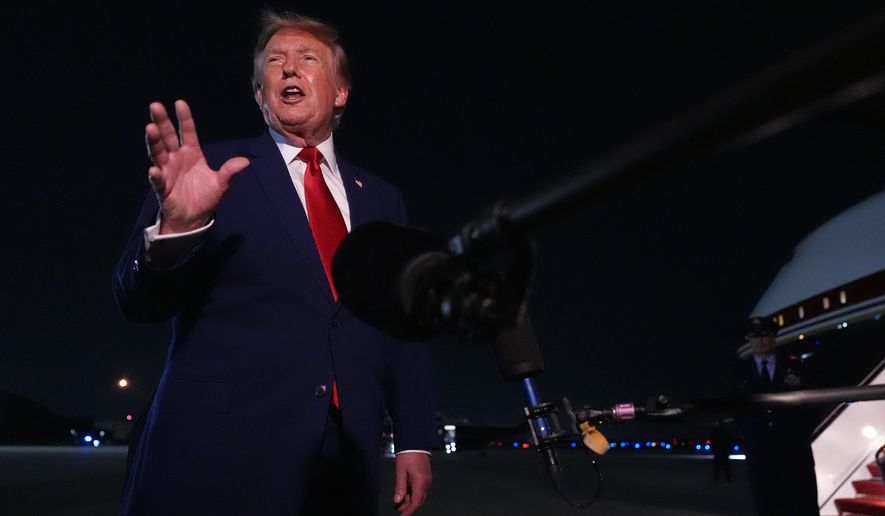 President Donald Trump talks to reporters after arriving on Air Force One Tuesday, Aug. 11, 2026, at Joint Base Andrews, Md. (AP Photo/Mark Schiefelbein)