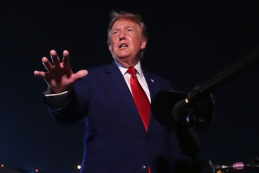 President Donald Trump talks to reporters after arriving on Air Force One Tuesday, Aug. 11, 2026, at Joint Base Andrews, Md. (AP Photo/Mark Schiefelbein)