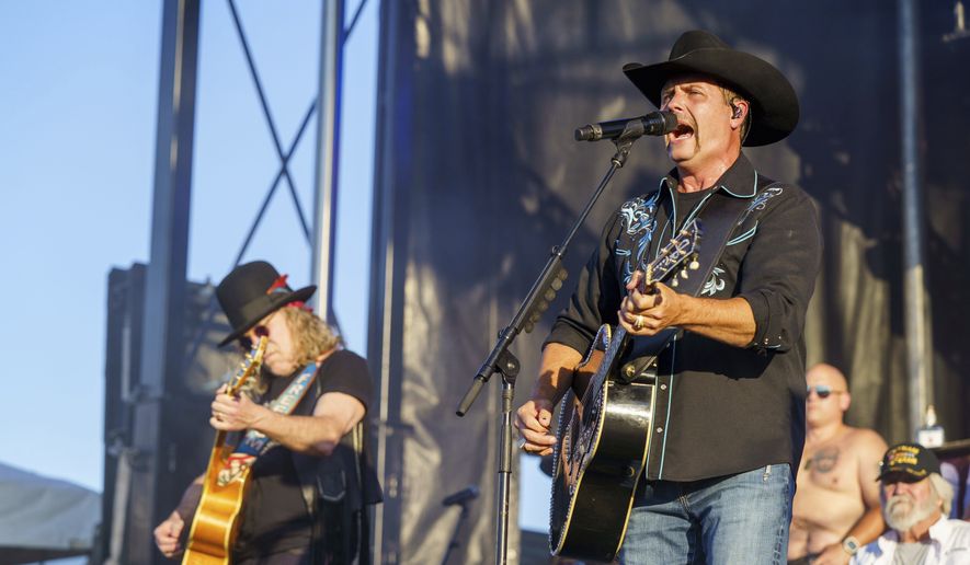 Big Kenny, left, and John Rich, of the band Big & Rich, perform during Patriots Fest on Saturday, May 18, 2024, in Aurora, Ill. (Photo by Rob Grabowski/Invision/AP)