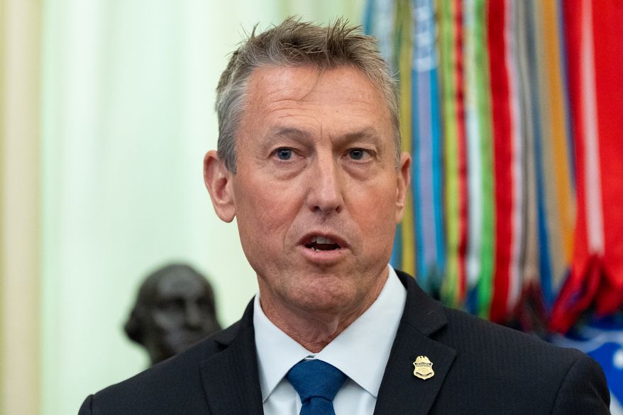 Commissioner of U.S. Customs and Border Protection Rodney Scott speaks in the Oval Office with President Donald Trump a the White House, Wednesday, June 3, 2026, in Washington. (AP Photo/Alex Brandon)