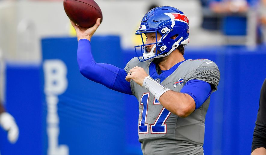 Buffalo Bills quarterback Josh Allen looks to throw during practice at the team's NFL football training camp Saturday, Aug. 8, 2026, in Orchard Park, N.Y. (AP Photo/Adrian Kraus)