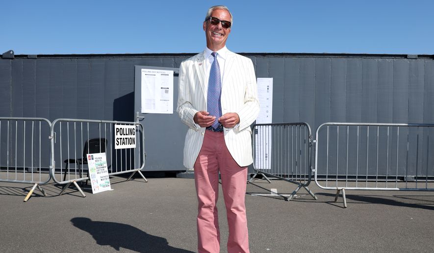 Britain's Reform UK party leader Nigel Farage arrives at a polling station in Walton on the Naze, Thursday, Aug. 13, 2026 to cast his vote for the Clacton on Sea by-election.(AP Photo/Richard Pelham)