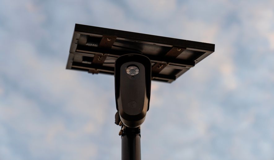 A Flock Safety license plate reader is seen along a public road, Thursday, Oct. 16, 2025, in Houston. (AP Photo/David Goldman, File)