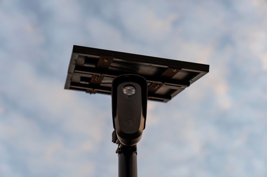 A Flock Safety license plate reader is seen along a public road, Thursday, Oct. 16, 2025, in Houston. (AP Photo/David Goldman, File)