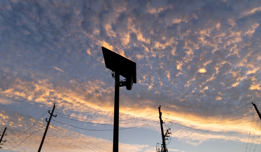 FILE - A Flock Safety license plate reader is seen along a public road, Thursday, Oct. 16, 2025, in Houston. (AP Photo/David Goldman, File)