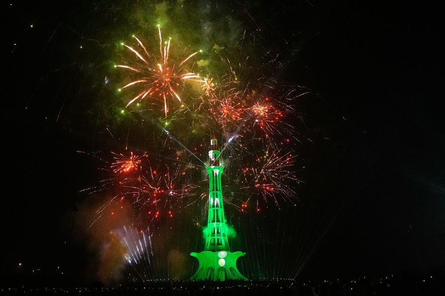 Fireworks light the sky over the Minar-e-Pakistan monument marking Independence Day in Lahore, Pakistan, Friday, Aug. 14, 2026. (AP Photo/K.M. Chaudary)