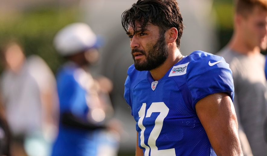 Los Angeles Rams wide receiver Puka Nacua walks the field following the NFL football team's training camp, Wednesday, Aug. 5, 2026, in Los Angeles. (AP Photo/Mark J. Terrill)