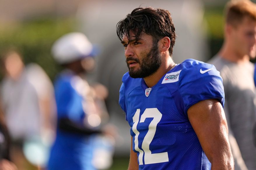 Los Angeles Rams wide receiver Puka Nacua walks the field following the NFL football team's training camp, Wednesday, Aug. 5, 2026, in Los Angeles. (AP Photo/Mark J. Terrill)