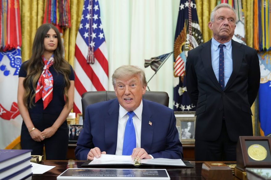 President Donald Trump speaks as Health and Human Services Secretary Robert F. Kennedy Jr., right, and Jayme Franklin listen during a meeting to sign an executive order about vaccines, Monday, Aug. 10, 2026, in the Oval Office of the White House in Washington. (AP Photo/Jacquelyn Martin)