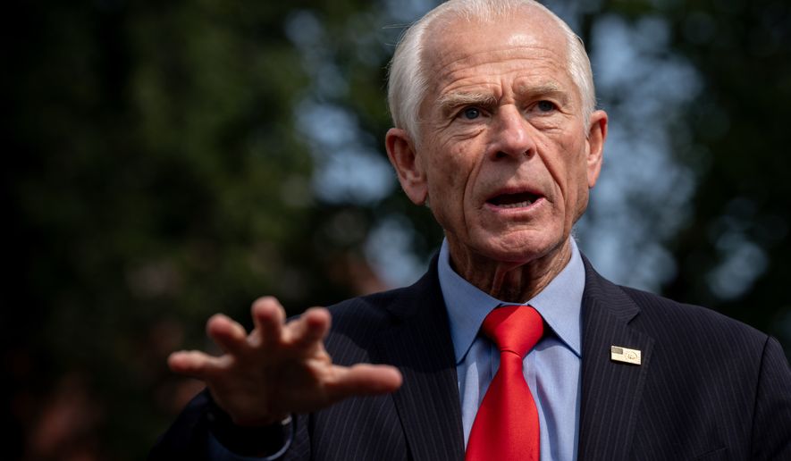 White House trade counselor Peter Navarro speaks with reporters following a video interview with Real America's Voice News, Tuesday, Aug. 11, 2026, outside the White House in Washington. (AP Photo/Julia Demaree Nikhinson) **FILE**