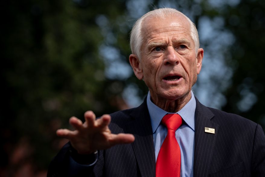 White House trade counselor Peter Navarro speaks with reporters following a video interview with Real America's Voice News, Tuesday, Aug. 11, 2026, outside the White House in Washington. (AP Photo/Julia Demaree Nikhinson) **FILE**