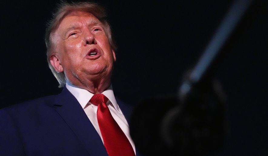 President Donald Trump talks to reporters after arriving on Air Force One at Joint Base Andrews, Md., on Tuesday, Aug. 11, 2026. (AP Photo/Mark Schiefelbein) **FILE**