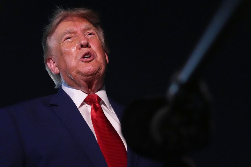 President Donald Trump talks to reporters after arriving on Air Force One at Joint Base Andrews, Md., on Tuesday, Aug. 11, 2026. (AP Photo/Mark Schiefelbein) **FILE**
