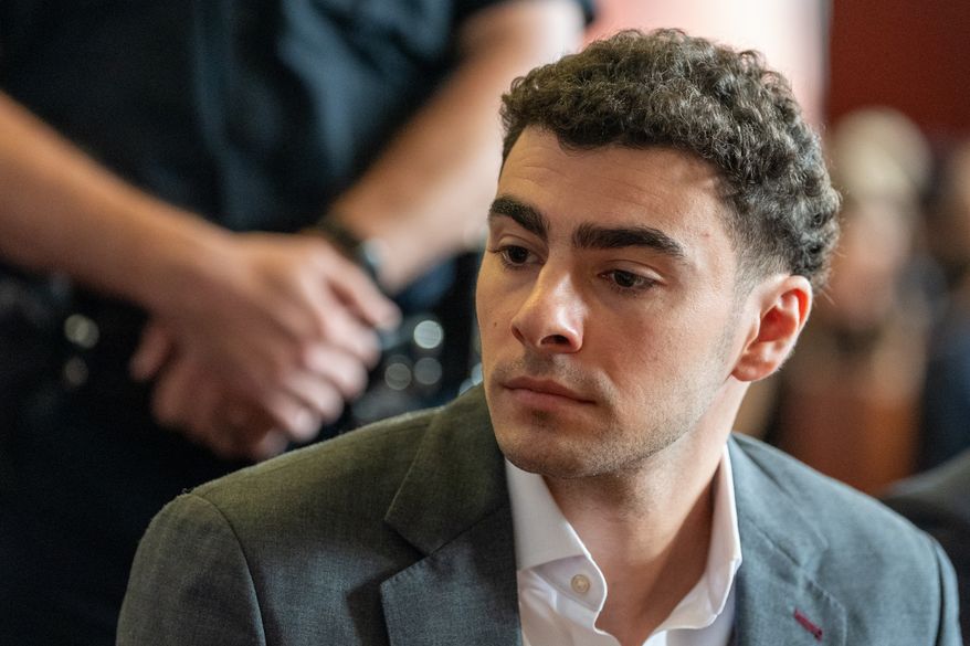Luigi Mangione attends a pre-trial hearing at Manhattan Criminal Court in New York, Tuesday, Aug. 11, 2026. (David Dee Delgado/Pool Photo via AP)