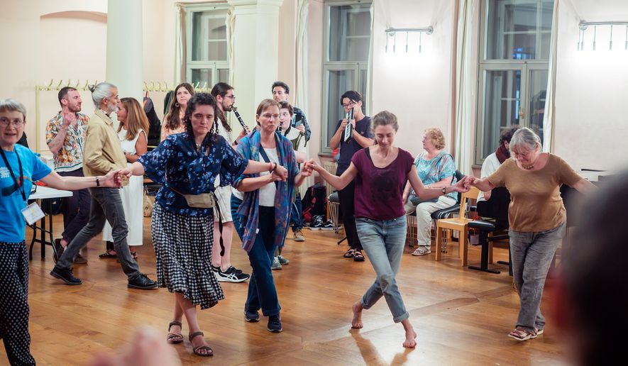 Attendees dance during a Yiddish Summer Weimar event on July 24, 2026, in Weimar, Germany. (Shendl Copitman/Religion News Service via AP)