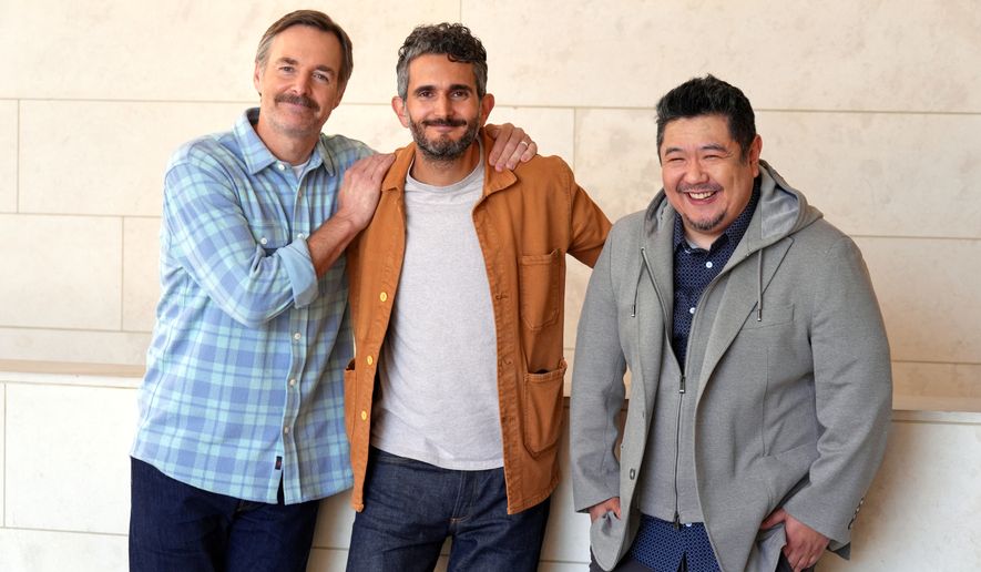 Director Dave Green, center, poses for a portrait with Will Forte, left, and Eric Bauza to promote the film "Coyote vs. Acme" on Tuesday, June 9, 2026, in Los Angeles. (AP Photo/Chris Pizzello)