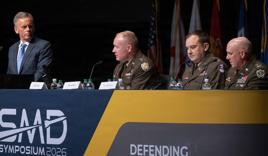 Lt. Gen. Brian W. Gibson, Deputy Director of Golden Dome for America (center), participates in a panel discussion regarding missile defense issues Aug. 11 at the Space and Missile Defense Symposium in Huntsville, Ala. Also photographed are the moderator, retired Army Lt. Gen. Dan Karbler (left), Col. Tom Petrini, G-3 of the U.S. Army Space and Missile Defense Command, and Col. Doug Marshall, Deputy Director of Operations for U.S. Northern Command. Courtesy photo: Missile Defense Agency via DVIDS.