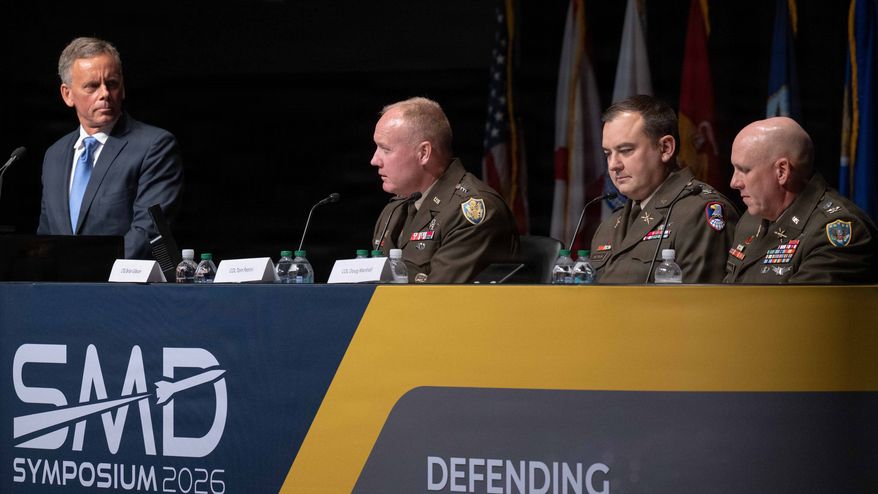 Lt. Gen. Brian W. Gibson, Deputy Director of Golden Dome for America (center), participates in a panel discussion regarding missile defense issues Aug. 11 at the Space and Missile Defense Symposium in Huntsville, Ala. Also photographed are the moderator, retired Army Lt. Gen. Dan Karbler (left), Col. Tom Petrini, G-3 of the U.S. Army Space and Missile Defense Command, and Col. Doug Marshall, Deputy Director of Operations for U.S. Northern Command. Courtesy photo: Missile Defense Agency via DVIDS.