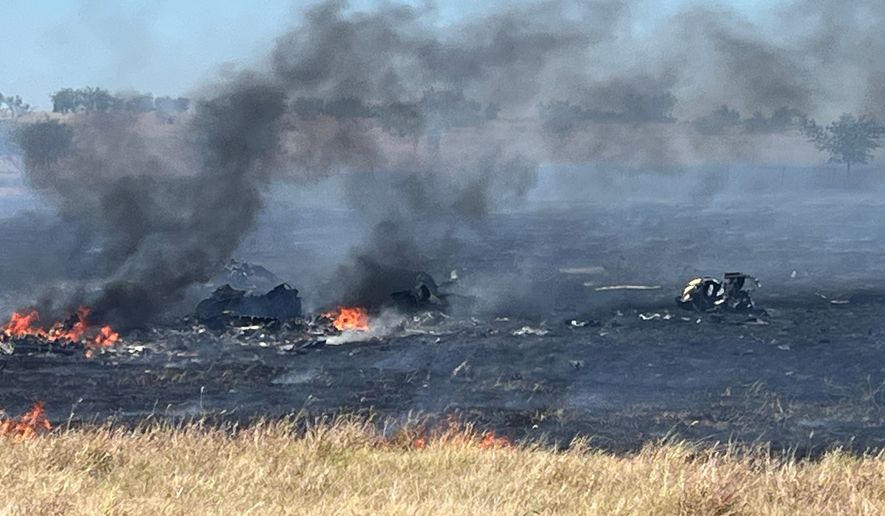This photo provided by the Bell County Sheriff's Office shows the scene of an Army Apache helicopter crash Wednesday, Aug. 12, 2026, near Salado, Texas. (Cliff Coleman/Bell County Sherrif's Office via AP)