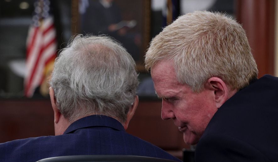 Alex Murdaugh speaks with his attorney, Dick Harpootlian, a status hearing on Friday, Aug. 14, 2026 at the Marc H. Westbrook Judicial Center in Lexington, S.C. (Tracy Glantz /The State via AP, Pool)