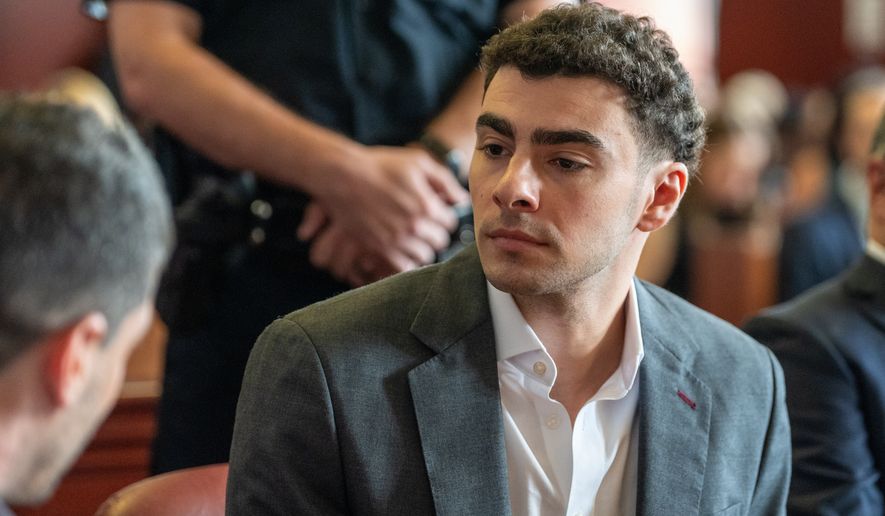 Luigi Mangione appears for a pre-trial hearing at Manhattan Criminal Court in New York, on Tuesday, Aug. 11, 2026. (David Dee Delgado/Pool Photo via AP)