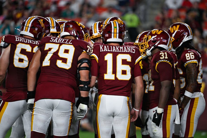 Washington Commanders quarterback Athan Kaliakmanis (16) huddles with the offense during the second half against the Miami Dolphins at Northwest Stadium in Landover, Maryland, August 14, 2026. (Photo by Brian Murphy for the Washington Times)