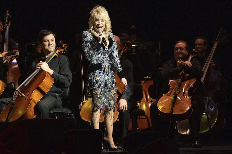 Dolly Parton performs during for "Threads: My Songs in Symphony" on Thursday, March 20, 2025, in Nashville, Tenn. (Photo by Amy Harris/Invision/AP)