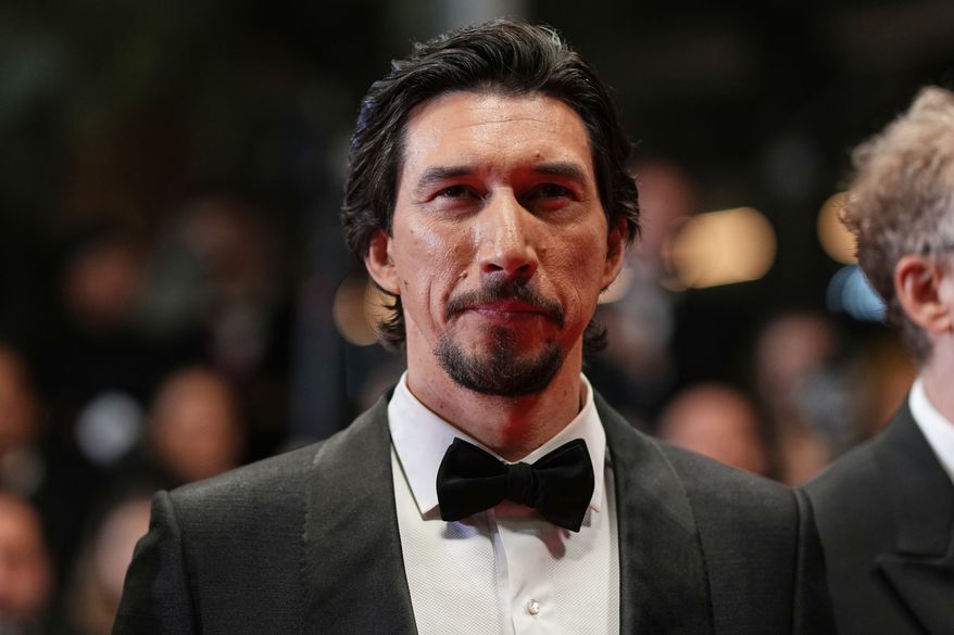 Adam Driver poses for photographers upon arrival at the premiere of the film 'Paper Tiger' at the 79th international film festival, Cannes, southern France, Saturday, May 16, 2026. (Photo by Scott A Garfitt/Invision/AP, File)