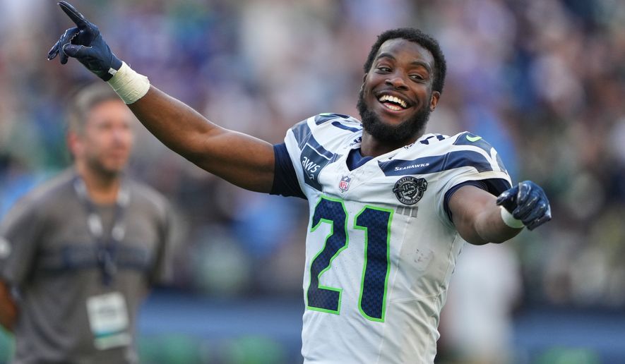 Seattle Seahawks cornerback Devon Witherspoon reacts after the NFL football team's training camp, Saturday, Aug. 8, 2026, in Seattle. (AP Photo/Lindsey Wasson)