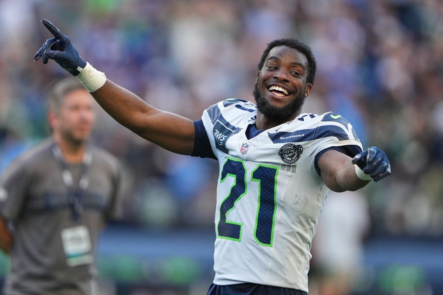 Seattle Seahawks cornerback Devon Witherspoon reacts after the NFL football team's training camp, Saturday, Aug. 8, 2026, in Seattle. (AP Photo/Lindsey Wasson)