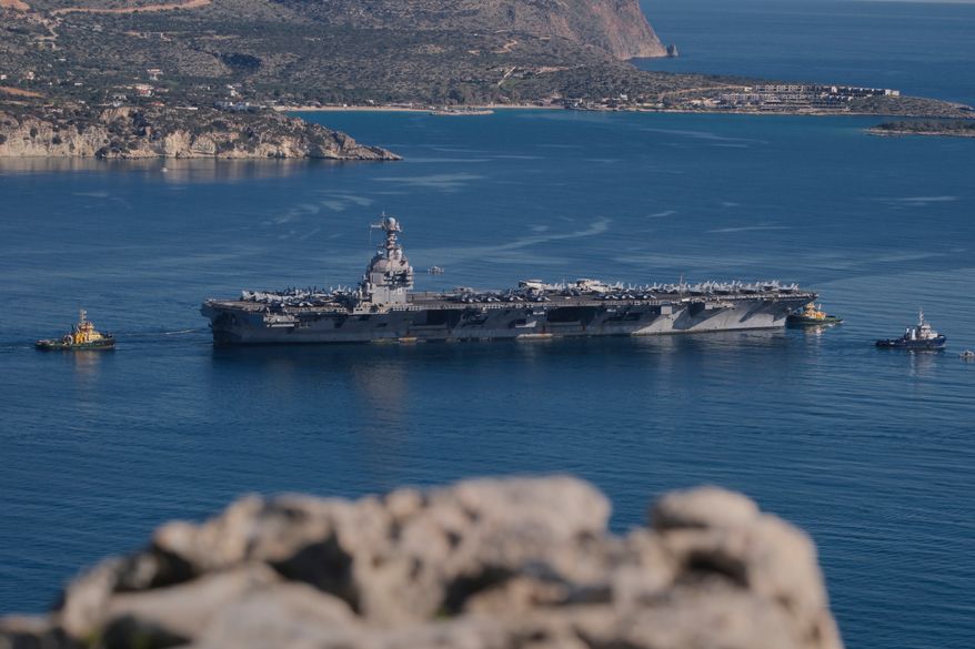 The USS Gerald R. Ford departs from Souda Naval Base near Chania on the island of Crete, Greece, Feb. 26, 2026. (AP Photo/Giannis Angelakis, File)