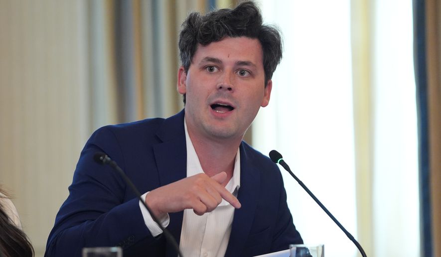 Cam Higby speaks during a roundtable meeting with President Donald Trump on antifa in the State Dining Room at the White House, Wednesday, Oct. 8, 2025, in Washington. (AP Photo/Evan Vucci)