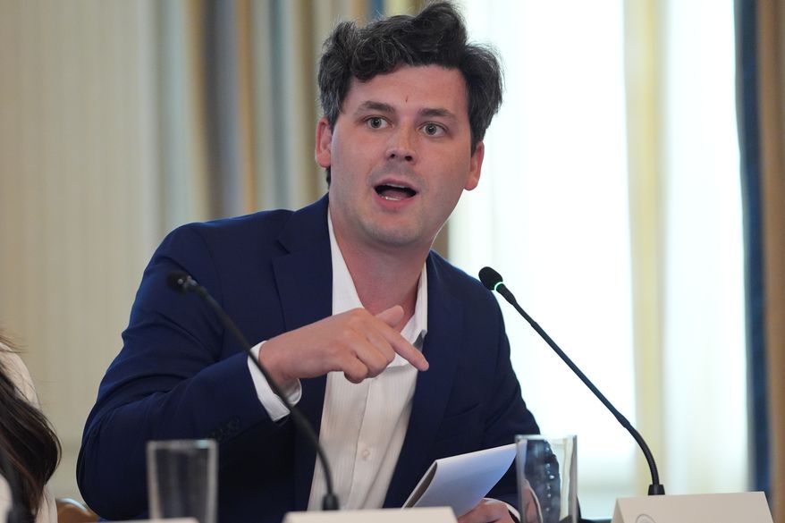Cam Higby speaks during a roundtable meeting with President Donald Trump on antifa in the State Dining Room at the White House, Wednesday, Oct. 8, 2025, in Washington. (AP Photo/Evan Vucci)