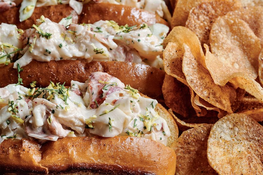 This image released by Voracious shows a recipe for lobster rolls from the cookbook "Home" by Bryan Voltaggio. (Ed Anderson/Voracious via AP)