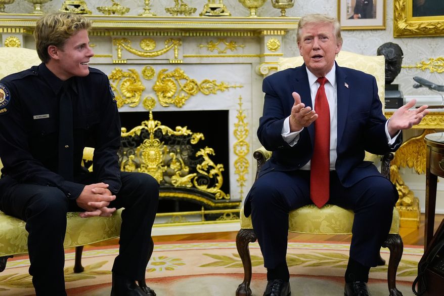 President Donald Trump speaks as he meets with lifeguard Ryder Williams in the Oval Office of the White House, Monday, Aug. 17, 2026, in Washington. (AP Photo/Manuel Balce Ceneta)
