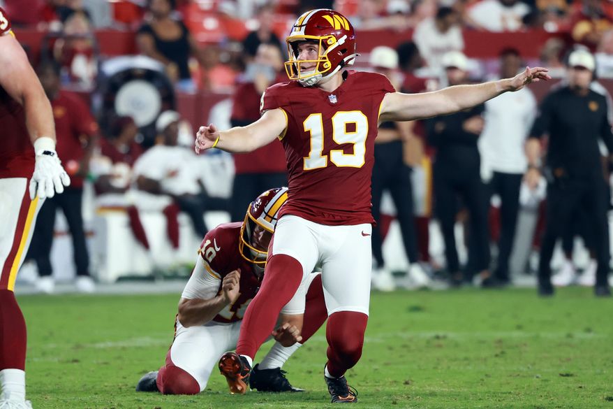 FILE - Washington Commanders place kicker Drew Stevens (19) kicks the ball during an NFL football game against the Miami Dolphins, Aug. 14, 2026 in Landover, Md. (AP Photo/Daniel Kucin Jr., File)
