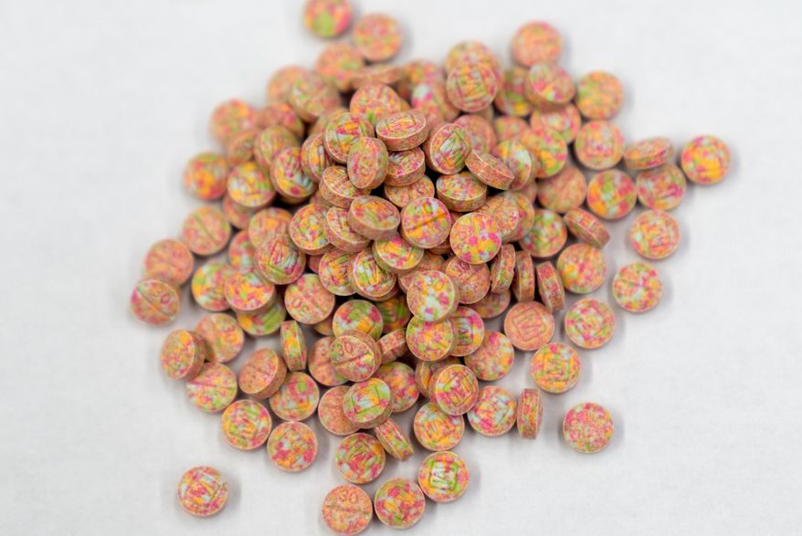Fentanyl pills are displayed at a Drug Enforcement Administration research laboratory on Tuesday, April 29, 2025, in Northern Virginia. (AP Photo/Mark Schiefelbein, File)