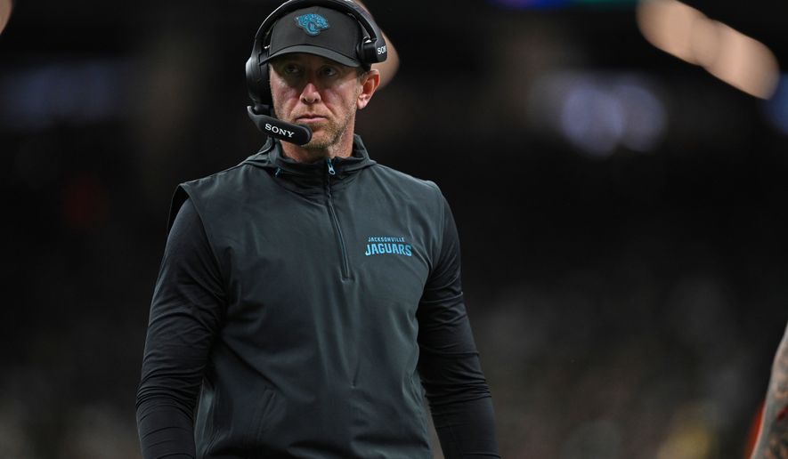 Jacksonville Jaguars head coach Liam Coen watches from the sidelines during the first half of an NFL preseason football game against the New Orleans Saints Saturday, Aug. 15, 2026, in New Orleans. (AP Photo/Ella Hall)