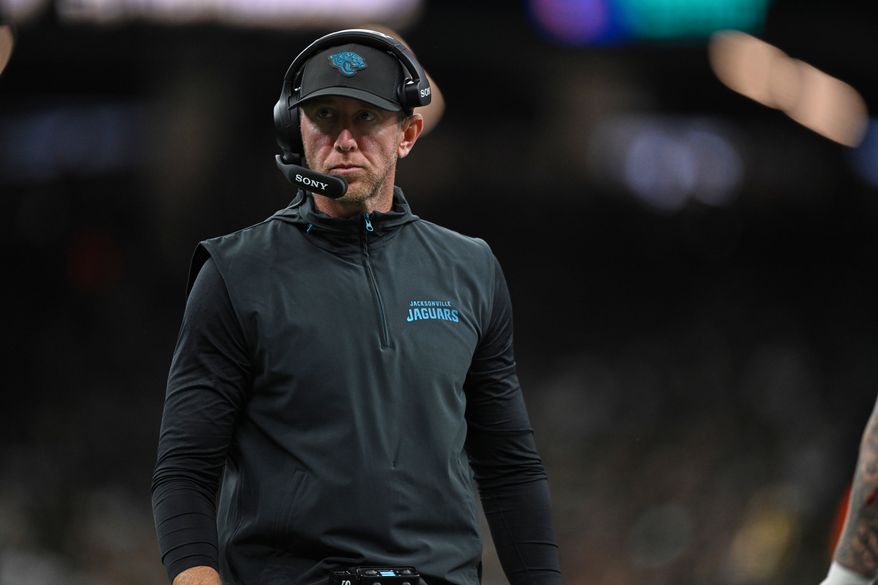 Jacksonville Jaguars head coach Liam Coen watches from the sidelines during the first half of an NFL preseason football game against the New Orleans Saints Saturday, Aug. 15, 2026, in New Orleans. (AP Photo/Ella Hall)