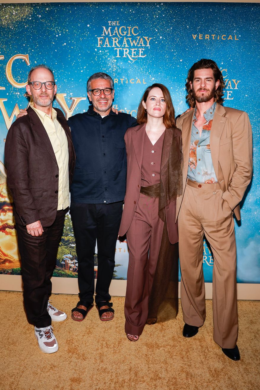 Nicolas Brown, from left, director Ben Gregor, Claire Foy, and Andrew Garfield attend "The Magic Faraway Tree" special screening at Regal Union Square on Wednesday, July 29, 2026, in New York. (Photo by CJ Rivera/Invision/AP)