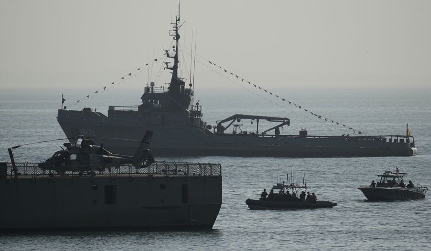 Military personnel take part in a U.S.-sponsored multinational military exercise in Panama City, Thursday, Aug. 13, 2026. (AP Photo/Matias Delacroix)