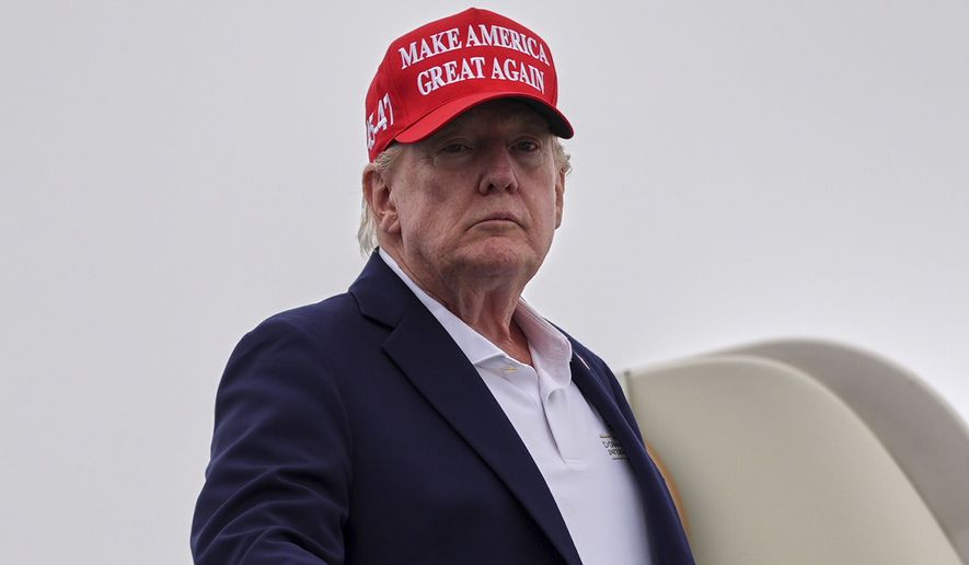 President Donald Trump boards Air Force One at Morristown Airport, Sunday, Aug. 16, 2026, in Morristown, N.J. (AP Photo/Julia Demaree Nikhinson)