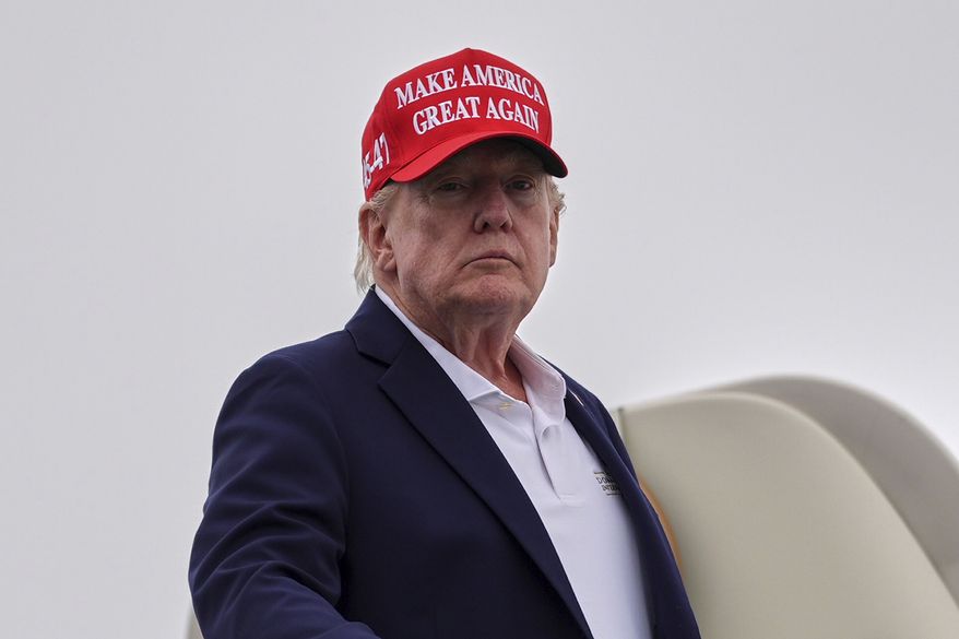 President Donald Trump boards Air Force One at Morristown Airport, Sunday, Aug. 16, 2026, in Morristown, N.J. (AP Photo/Julia Demaree Nikhinson)