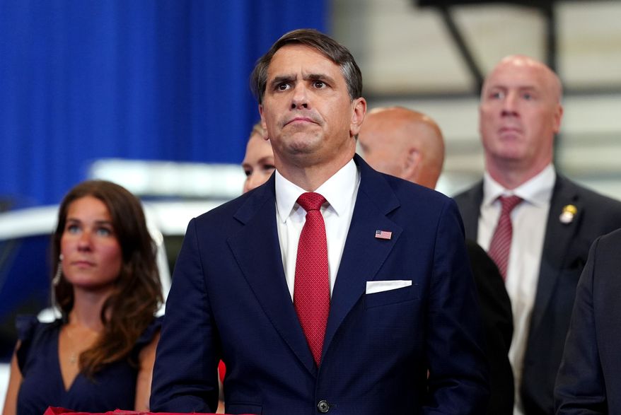 Attorney General Todd Blanche listens as President Donald Trump speaks at the David Mack Center for Training and Intelligence, Friday, Aug. 14, 2026, in Garden City, N.Y. (AP Photo/Julia Demaree Nikhinson)