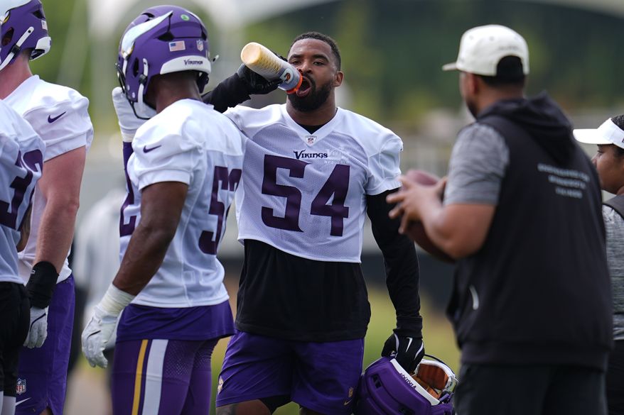 Minnesota Vikings linebacker Jamal Adams (54) hydrates during the team's NFL football training camp Wednesday, July 29, 2026, in Eagan, Minn. (AP Photo/Abbie Parr)
