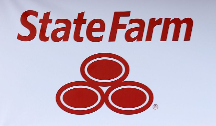 A State Farm logo is shown Thursday, July 11, 2013, in Richardson, Texas. (AP Photo/LM Otero)