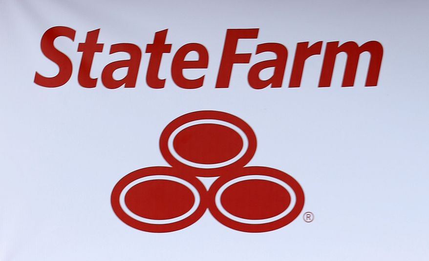 A State Farm logo is shown Thursday, July 11, 2013, in Richardson, Texas. (AP Photo/LM Otero)