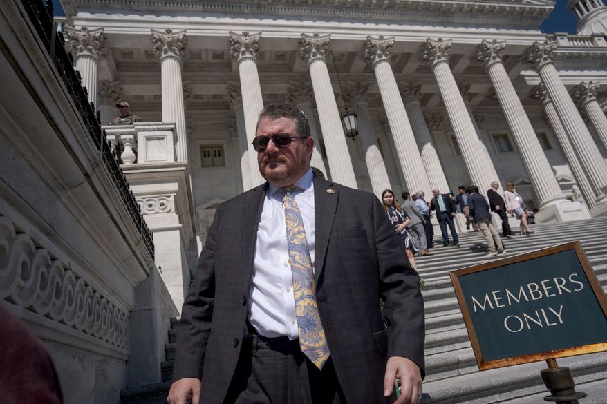Rep. Randy Fine, R-Fla., and other members of the House of Representatives leave for a five-week recess just after narrowly passing a resolution to halt U.S. military action in Iran, at the Capitol in Washington, Thursday, July 23, 2026. (AP Photo/J. Scott Applewhite)