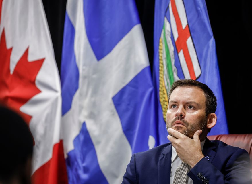 FILE - Parti Quebecois Leader Paul St-Pierre Plamondon listens to a question during a University of Calgary School of Public Policy event in Calgary, Thursday, Sept. 11, 2025. (Jeff McIntosh/The Canadian Press via AP, File)