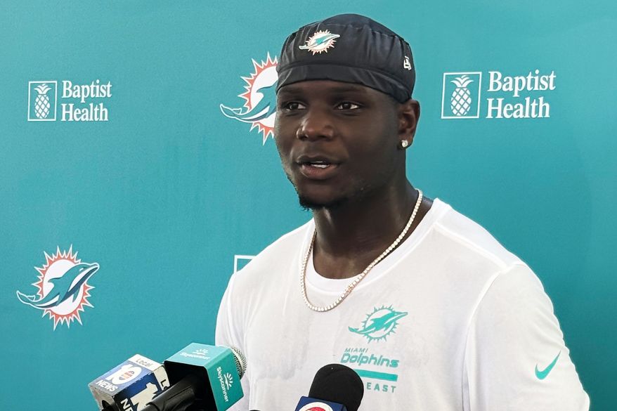Miami Dolphins wide receiver Chris Bell speaks with media after practice at the NFL football team's training camp, Tuesday, Aug. 18, 2026, in Miami Gardens, Fla. (AP Photo/Alanis Thames)